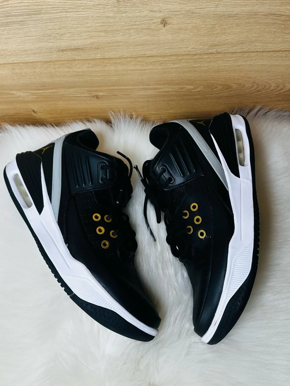 Jordan Max Aura 5 Black and Gold Athletic Sneakers